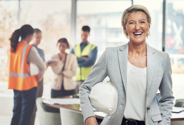 istock Portrait, construction worker and leader with an engineer woman at work in her architecture office. Industry, design and building with a ceo architect manager working on a development project 1487149204