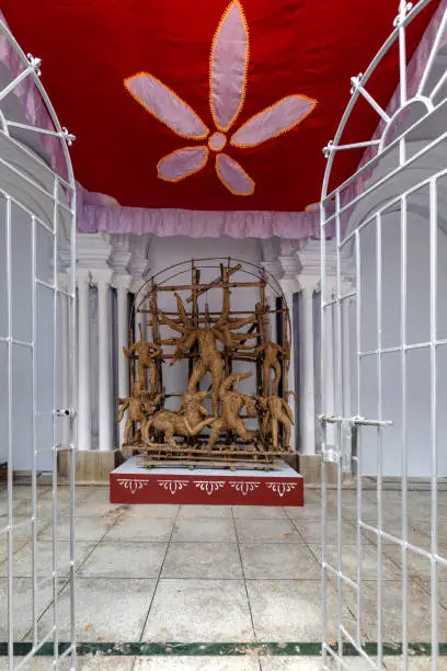 Photo of Incomplete Goddess Durga idol at the Thakur Dalan or Family Temple of a old Zamindar or Jamindar house, few days before the Durga Puja festival inKolkata, West Bengal, India.