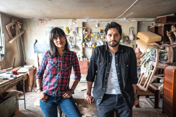 istock Portrait of coworkers at carpentry workshop 1487156574