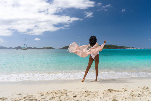 istock Woman with beach cover up 1487157222