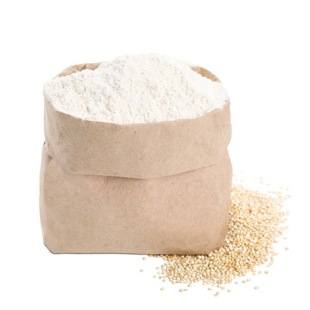 istock Paper bag with quinoa flour and grains isolated on white 1487161020