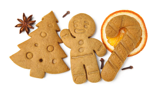 istock Different tasty cookies and spices on white background, top view 1487165210