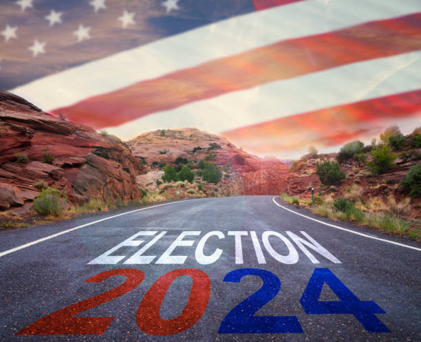 Presidential Election 2024 in the Unites States. Road with American flag stock photo