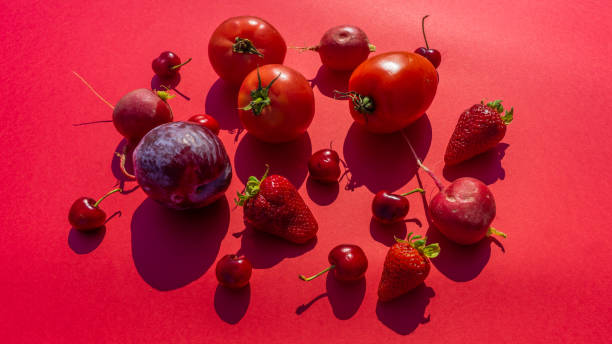 istock close-up monochromatic red vegetable and fruit still life. healthy concept 1487171753