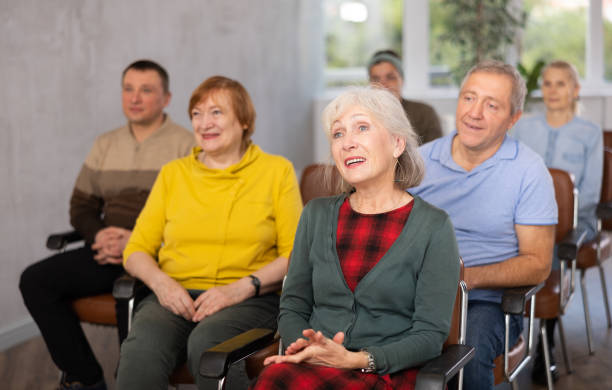 istock Adult students listening in classroom university 1487172964