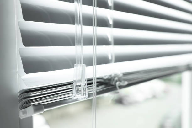 istock Closeup view of stylish horizontal window blinds 1487173187
