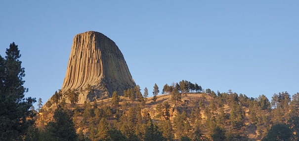 This is a photograph taken on a mobile phone outdoors of the Devil’s Tower National Monument in Wyoming during autumn of 2020.