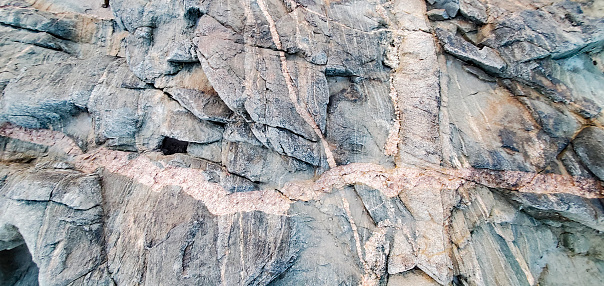 This is a photograph taken on a mobile phone outdoors of a rock texture in Curecanti National Recreation Area in Gunnison, Colorado.