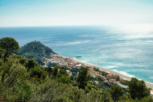 landscape of the medieval village of Varigotti and its coast on a hot summer day