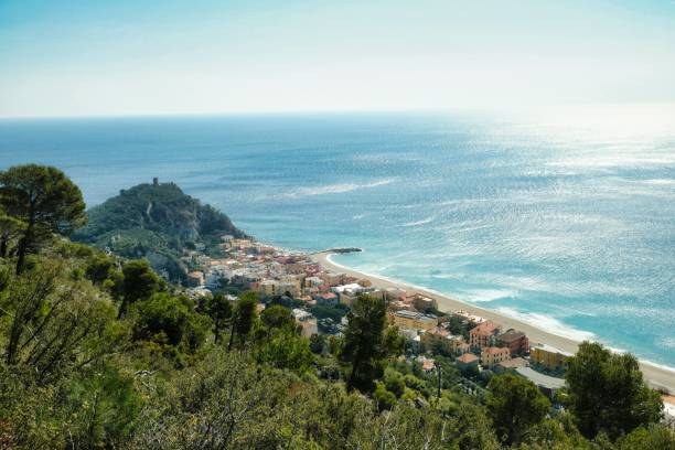 landscape of the medieval village of Varigotti landscape of the medieval village of Varigotti and its coast on a hot summer day finale ligure stock pictures, royalty-free photos & images