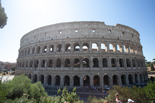 Photo of the Colosseum from a different angle, showing its\nmagnificence and history. Each detail of this monument tells a different moment that Rome has passed through the centuries.