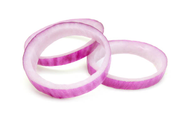 istock Red onion rings on white background 1487195115