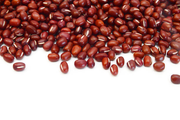 istock Adzuki beans pouring on white background 1487196666
