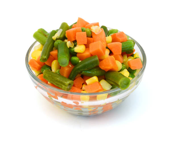 istock Fresh mixed vegetables on white. Golden mix. 1487196731