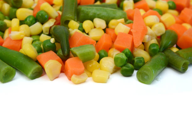istock Fresh mixed vegetables on white. Golden mix. 1487196734