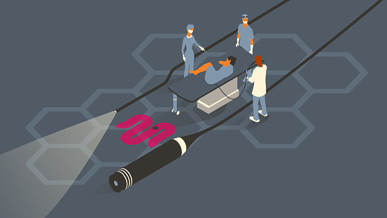 A patient receives a colonoscopy or sigmoidoscopy by a team of doctors, while an oversized glowing colonoscope or endoscope and a flat icon of an intestine emphasize the theme. A flat color palette leverages cool grays, blues, and some magenta highlights. Vector art is presented in isometric view on a 16x9 artboard.