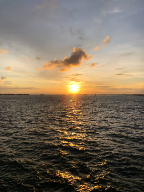 istock Sunset view from the middle of the sea 1487204971