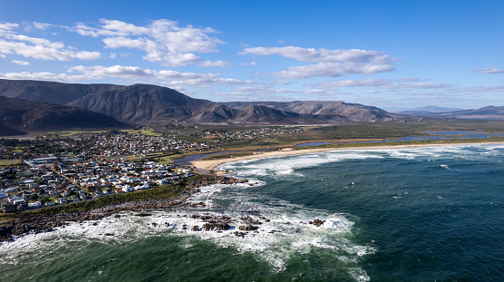 A aerial shot of the small coastal town of Kleinmond on the coastline near Cape Town.