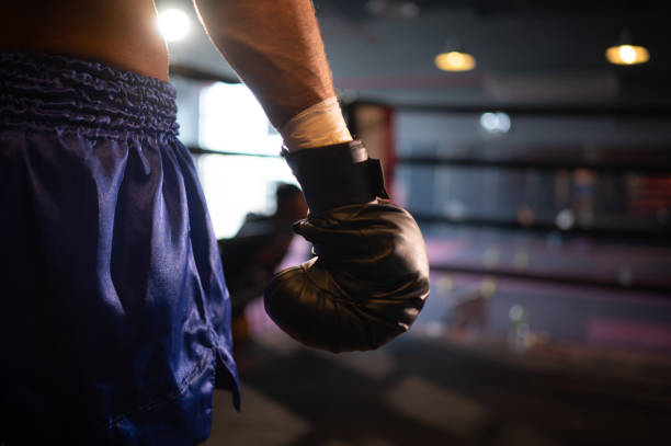 istock Boxing gloves that boxers must wear when punching on the ring or while practicing, Muay Thai, Thai martial arts. 1487212673