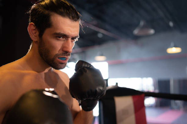 istock Muay Thai, Thai martial arts that foreigners are interested in learning and practicing for self-defense or as a professional boxer who fights on the stage. 1487212718