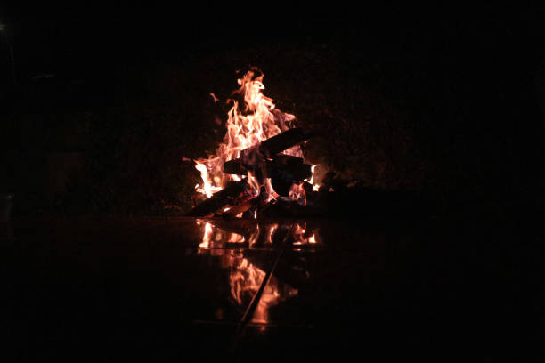 istock A background of fire in dark with a reflection of it. 1487215577