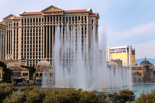 October 18, 2018 - Las Vegas, United States:  Panoramic aerial view of Luxury Hotels in Las Vegas strip at dusk: Paris, Venitian, Palazzo, Bellagio and many other luxury casino resorts in the heart of Las Vegas and the fountains of Bellagio Hotel