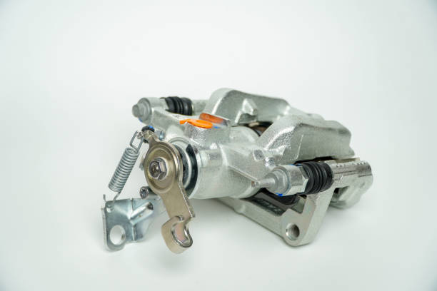 istock Rear brake caliper with brake pads isolated on white background,Car part on a white background, close-up, isolate. 1487220614