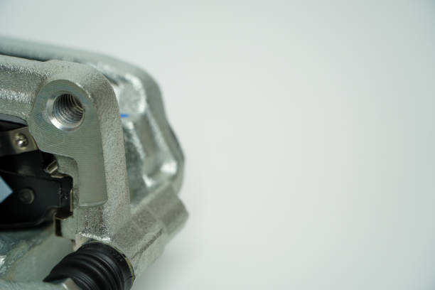 istock Rear brake caliper with brake pads isolated on white background,Car part on a white background, close-up, isolate. 1487220625