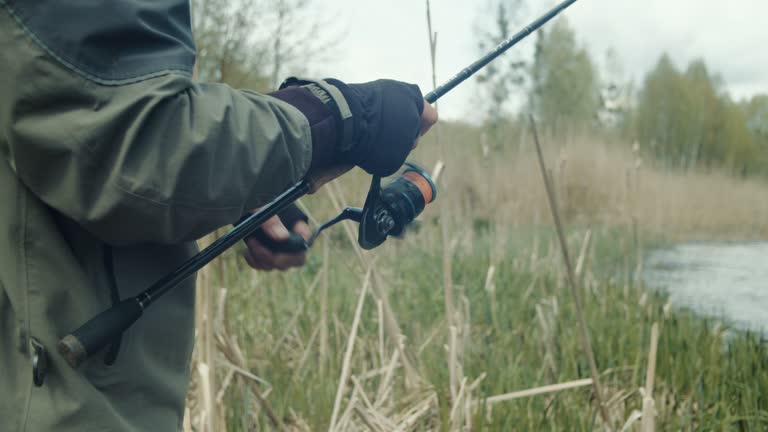 man catching fish