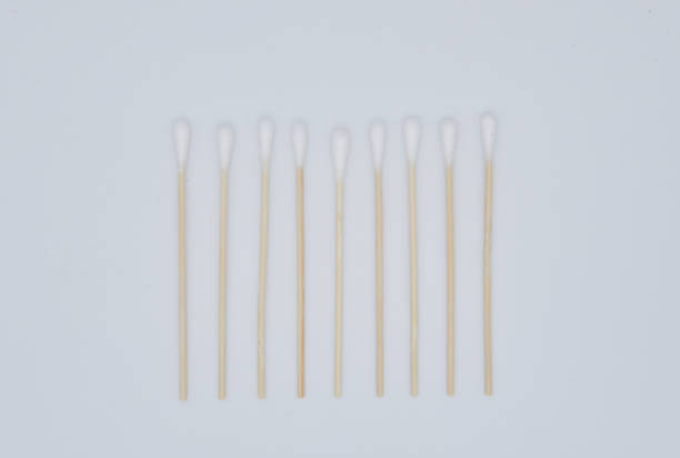 istock Neatly arranged medical white cotton swabs 1487231613