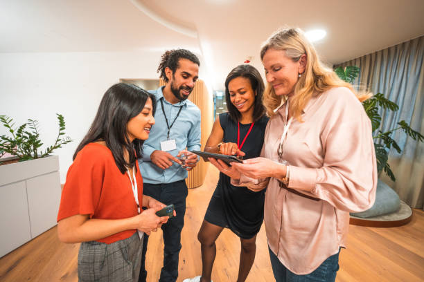 istock Professional Mixed Race Employees Collaborating in Modern Workspace 1487231734
