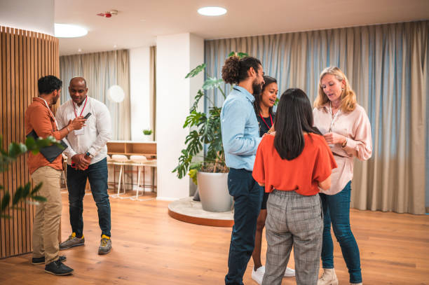istock Corporate Employees Collaborating on Business Matters with Wireless Technology 1487231789