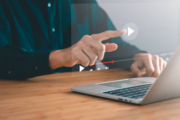 istock the man touching play icon on video online. video content creator concept. 1487235434