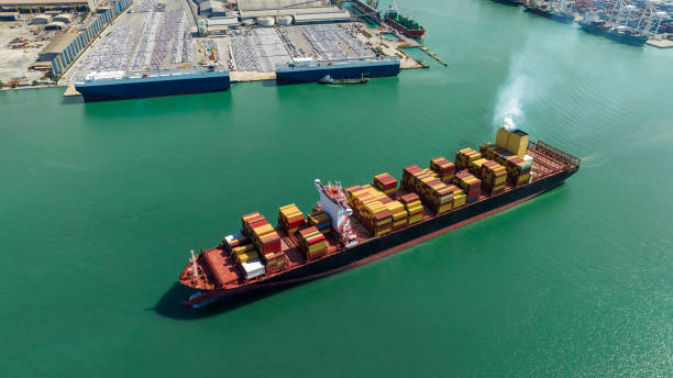 istock container cargo ship, import export commerce business and industry service logistic transportation  International by container cargo ship in open sea,  shipping logistic transport global maritime concept, 1487235461