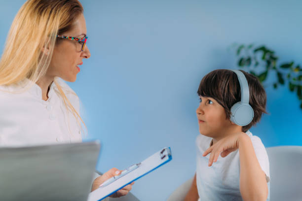 istock Hearing Test for Children. Audiologist Working with a Preschooler Boy 1487237120