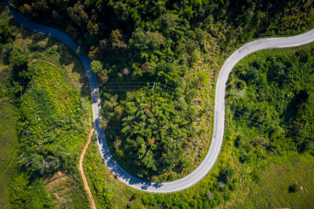 istock aerial view mountain paths rural road between the city 1487237220
