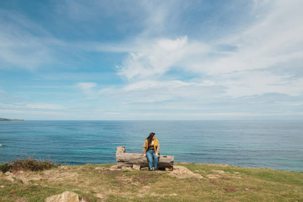 Young woman by the sea