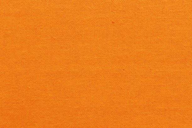 istock Orange cotton fabric cloth texture for background, natural textile pattern. 1487240555