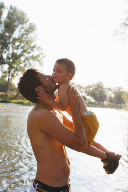 istock Family having refreshmnet in the river 1487241096