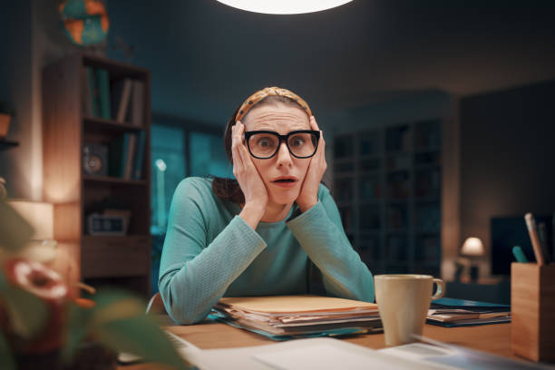 istock Stressed woman checking expensive bills at home 1487241955