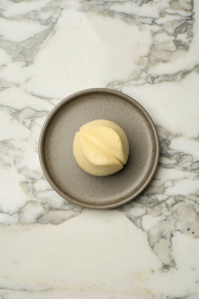 istock Tulip shape candy dessert on plate, close-up 1487243380