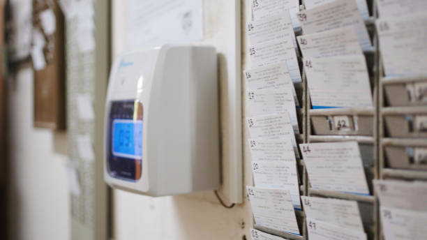 istock Attendance cards rack in ceramics factory 1487245064