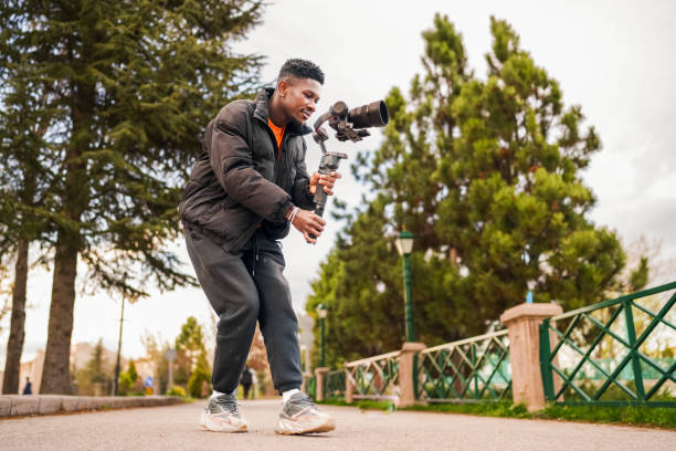 Cameraman filming with gimbal