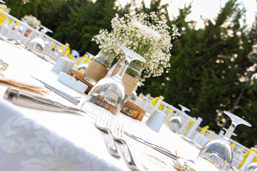 Dining table prepared for wedding dinner