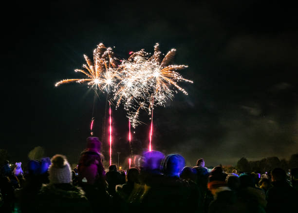 istock Crowds stood watching The Bicester Round Table fireworks display at Pingle Field, Bicester, Oxfordshire on Bonfire night 1487248186