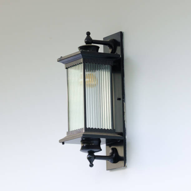 istock vintage lamp on the white wall 1487250514