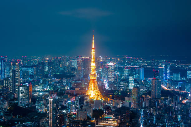 Aerial view over Tokyo tower and Tokyo cityscape view from Roppongi Hills at night in Tokyo Japan Aerial view over Tokyo tower and Tokyo cityscape view from Roppongi Hills at night in Tokyo Japan tokyo harajuku stock pictures, royalty-free photos & images
