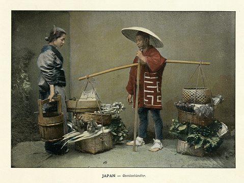 Vintage illustration of after a photograph, Japanese greengrocer, street vendor, carrying pole vegetables in baskets, History Japan 1890s, 19th Century