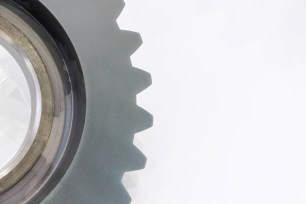 Partial close-up of gears on white background