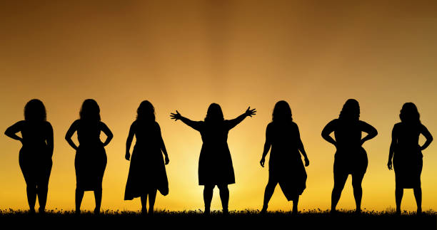 istock Active middle aged women on sunset background 1487256593